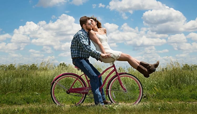 couple riding bike